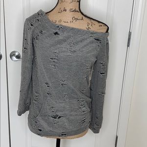 Distressed off the shoulder sweater